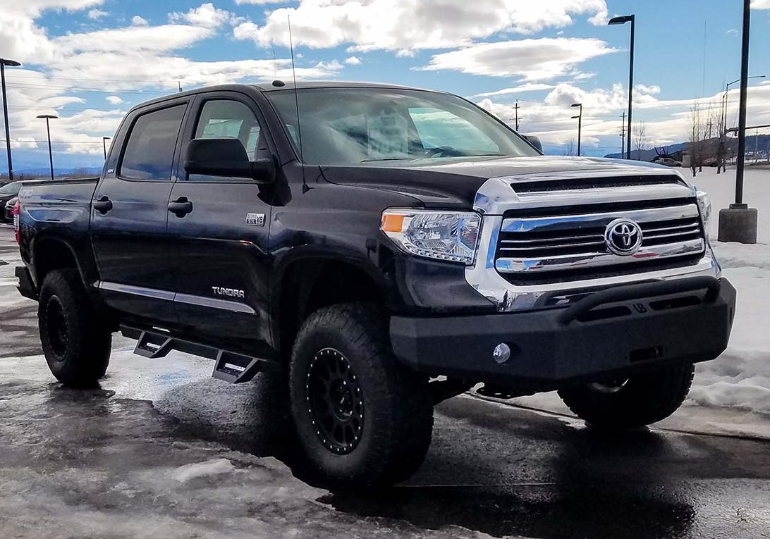 Black Toyota pick-up truck.