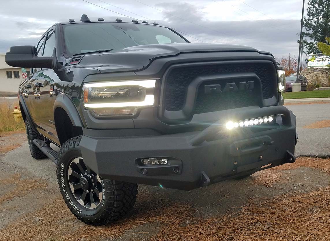 Ram truck with a black bumper. 