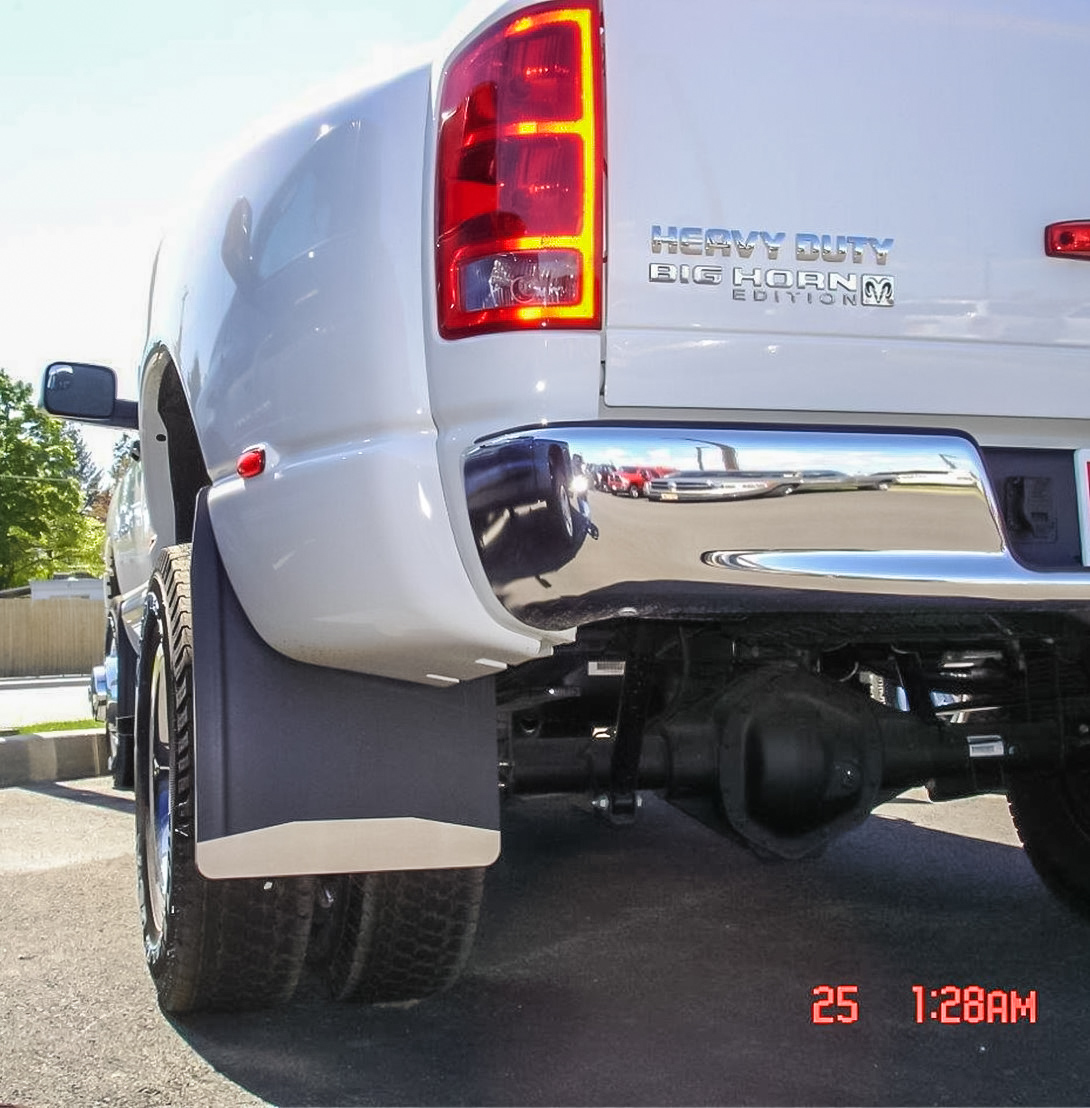 Mud flaps on a large dual-wheel truck.