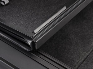 BAKFlip FiberMax Hard Folding Truck Bed Cover - Rail Mounts Near Top of Bed Rail - Rails Can Be Lowered Using Drop Down Brackets - 2022-2026 Toyota Tundra 5' 7" Bed with or without Deck Rail System w/out Trail Special Edition Storage Boxes