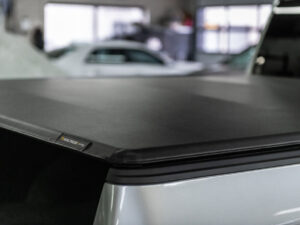 Trifecta ALX Tonneau Cover - Black - Leather Grained Fabric - 2021-2026 Ford F-150 5' 7" Bed (Includes Lightning)